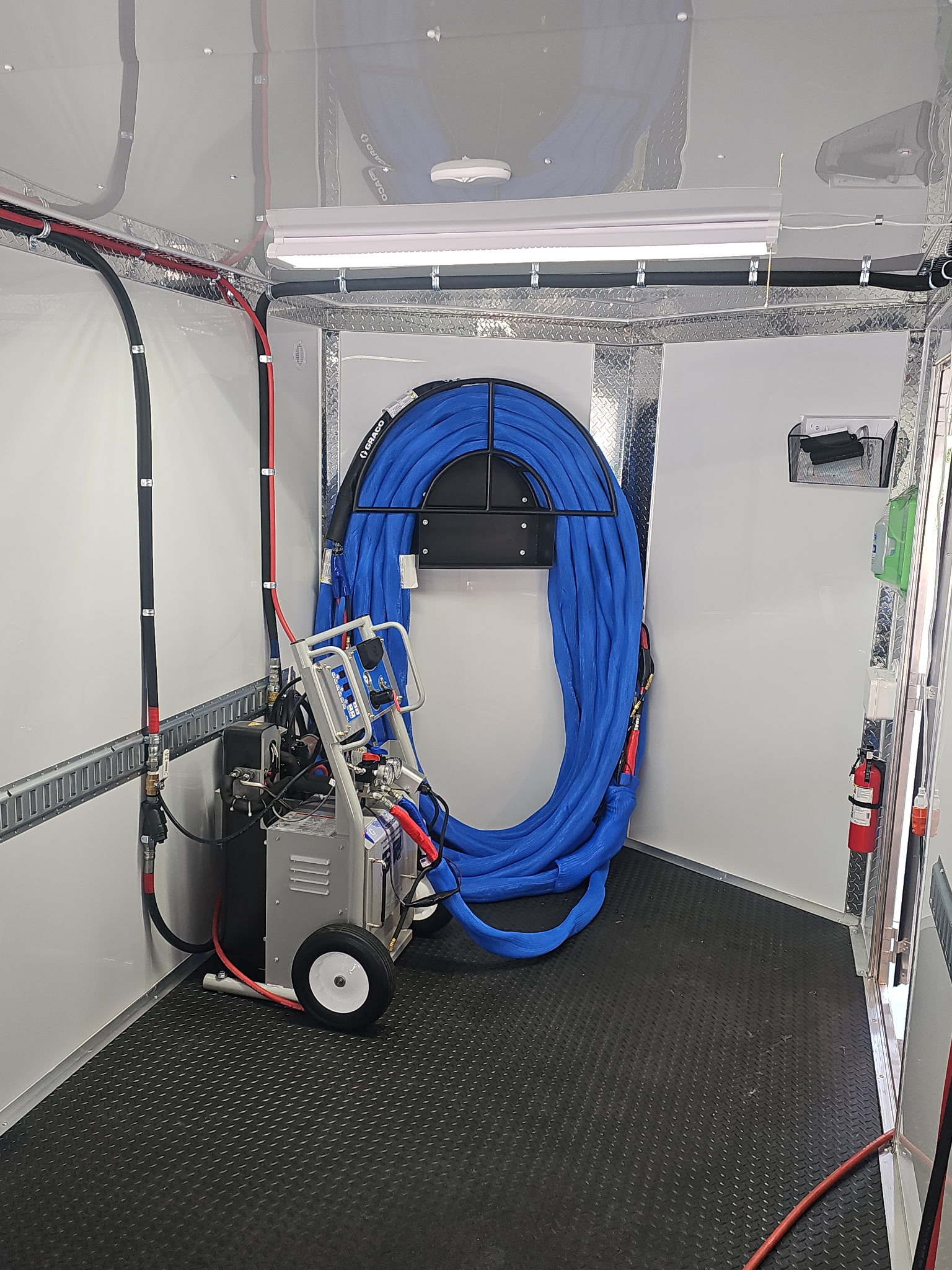 Spray foam hose and proportioner